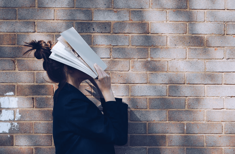 student with books